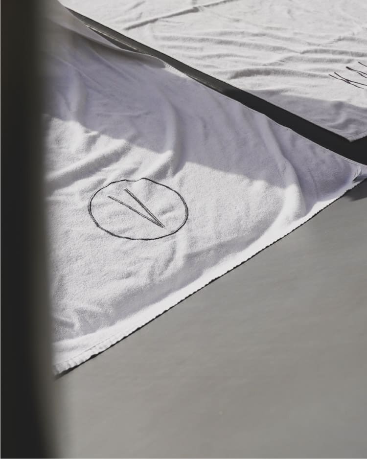 Handtuch mit dem Kai-Club-Monogramm
